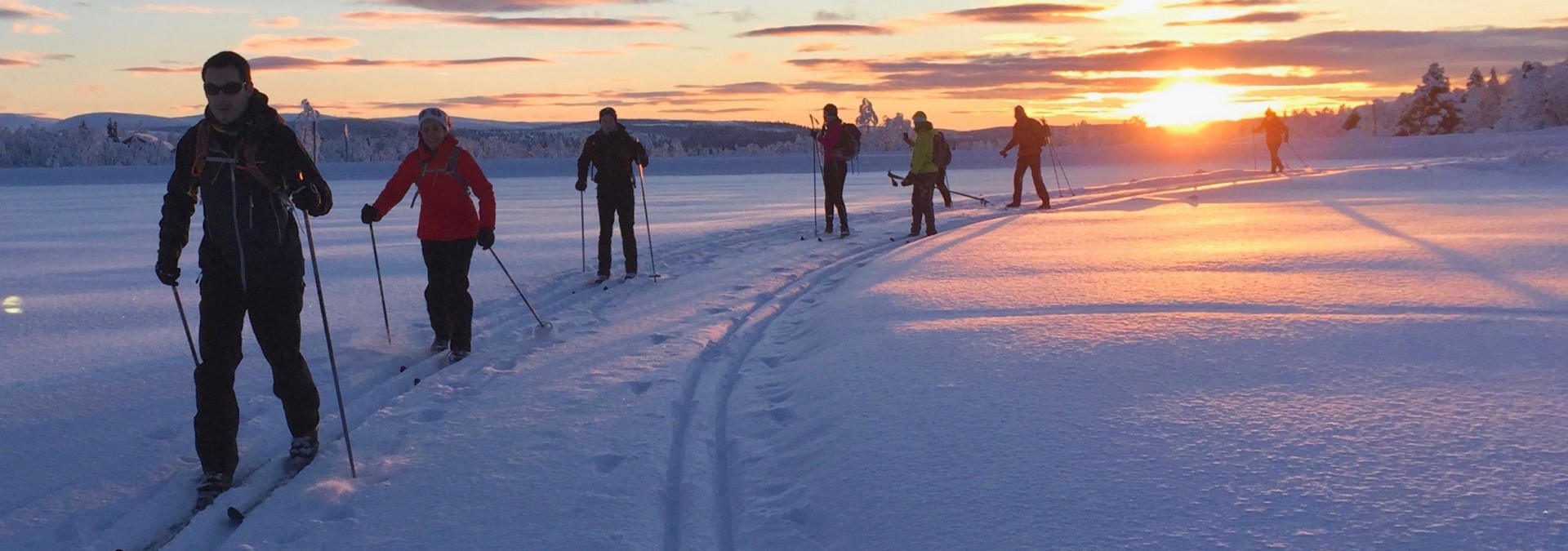 Putting our new found skills into practice on a ski journey in the sunset. Glorious!