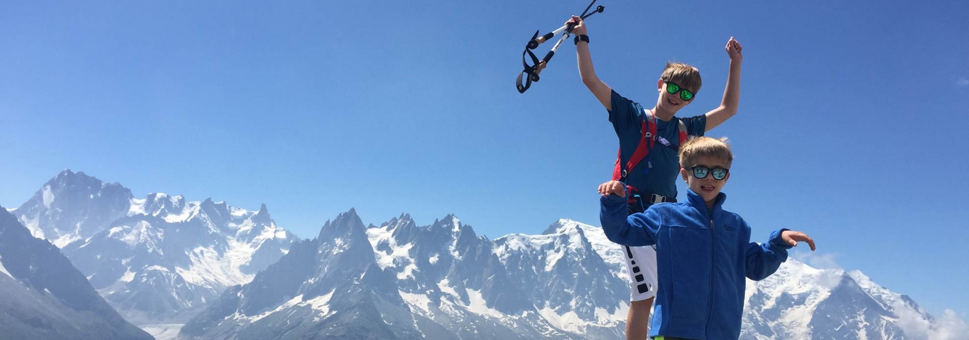 Family Tour du Mont Blanc - the boys give their opinion in front of the Mont Blanc chain