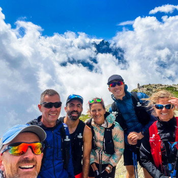 Running on the trails around Chamonix. Here we took a selfie above the clouds with our guide. 